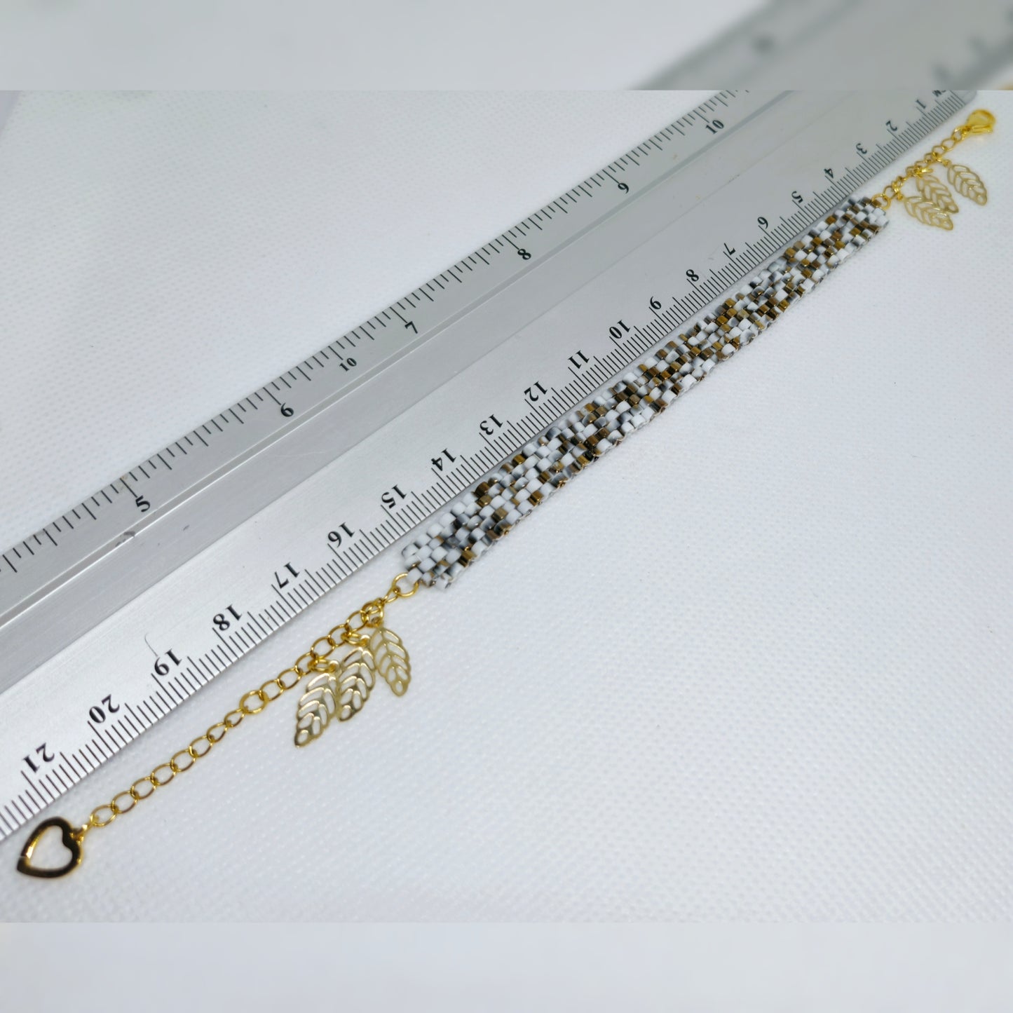 Armbandjes wit/goud