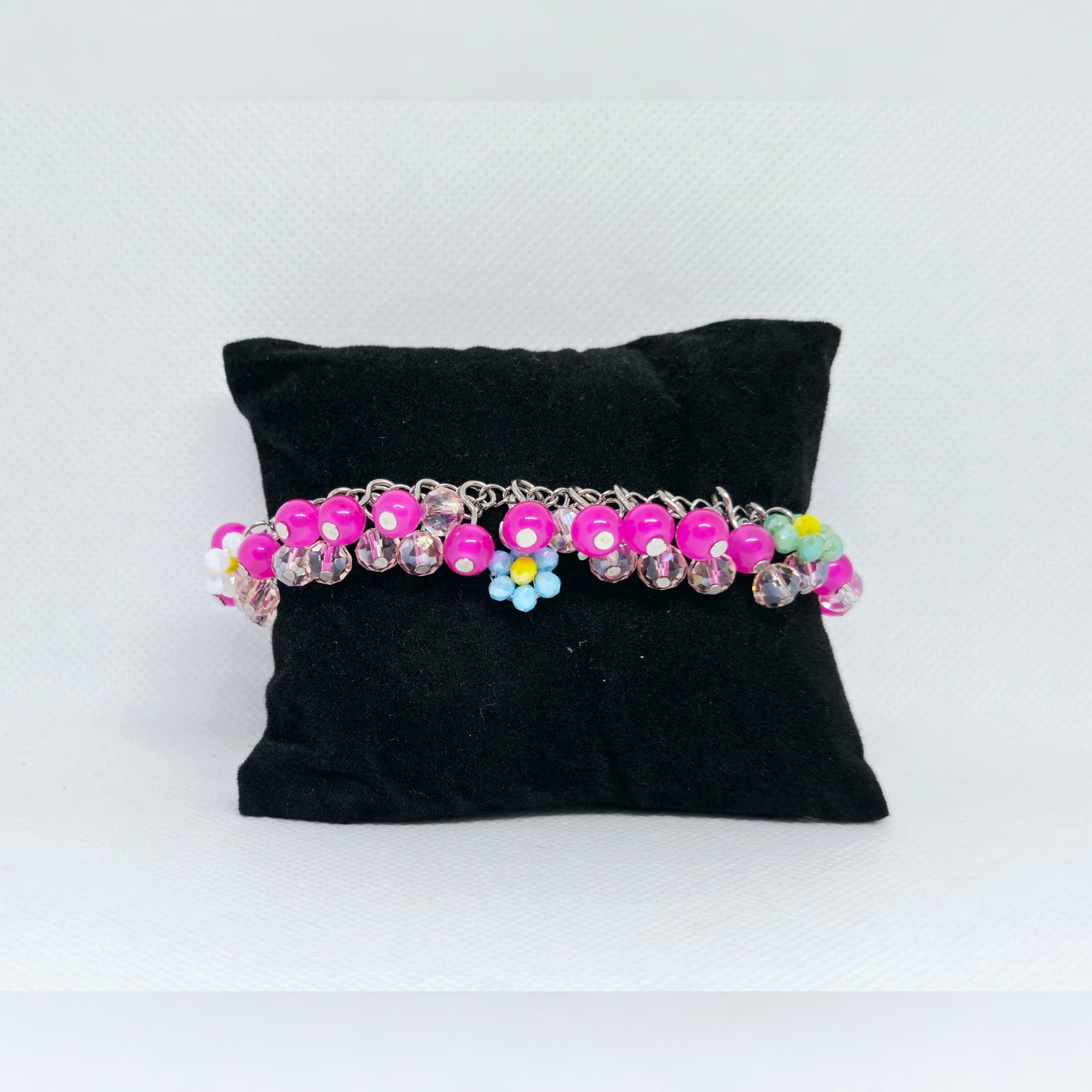 Roze cluster armbandje met bloemen