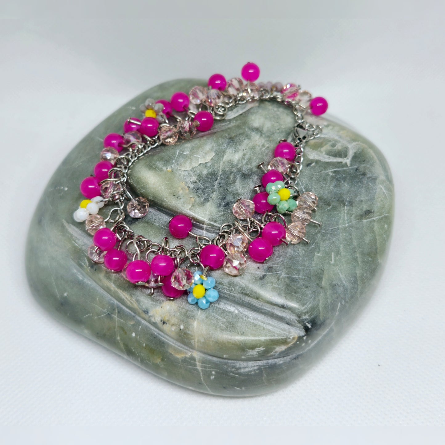 Roze cluster armbandje met bloemen
