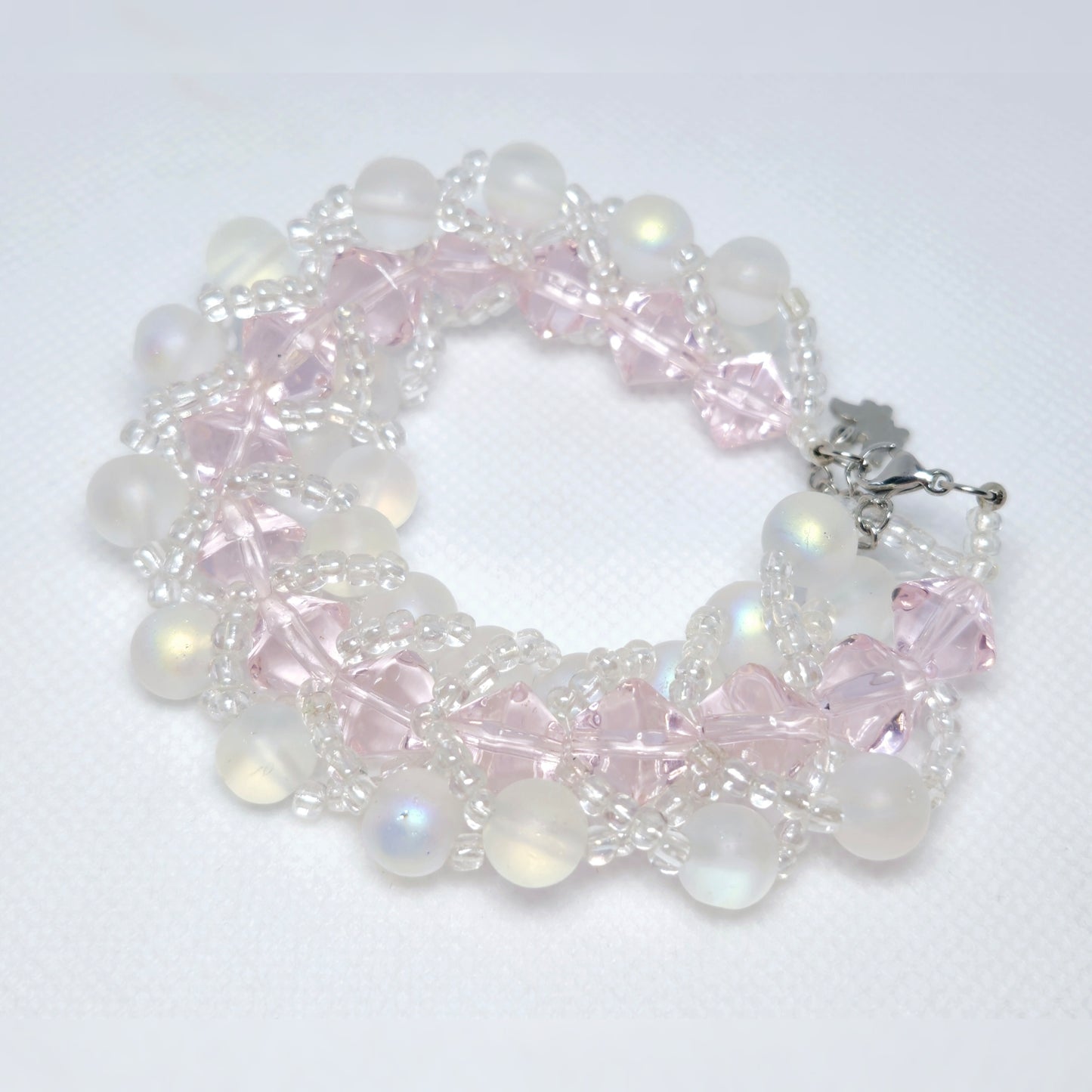 Handgemaakte vlecht-armband roze