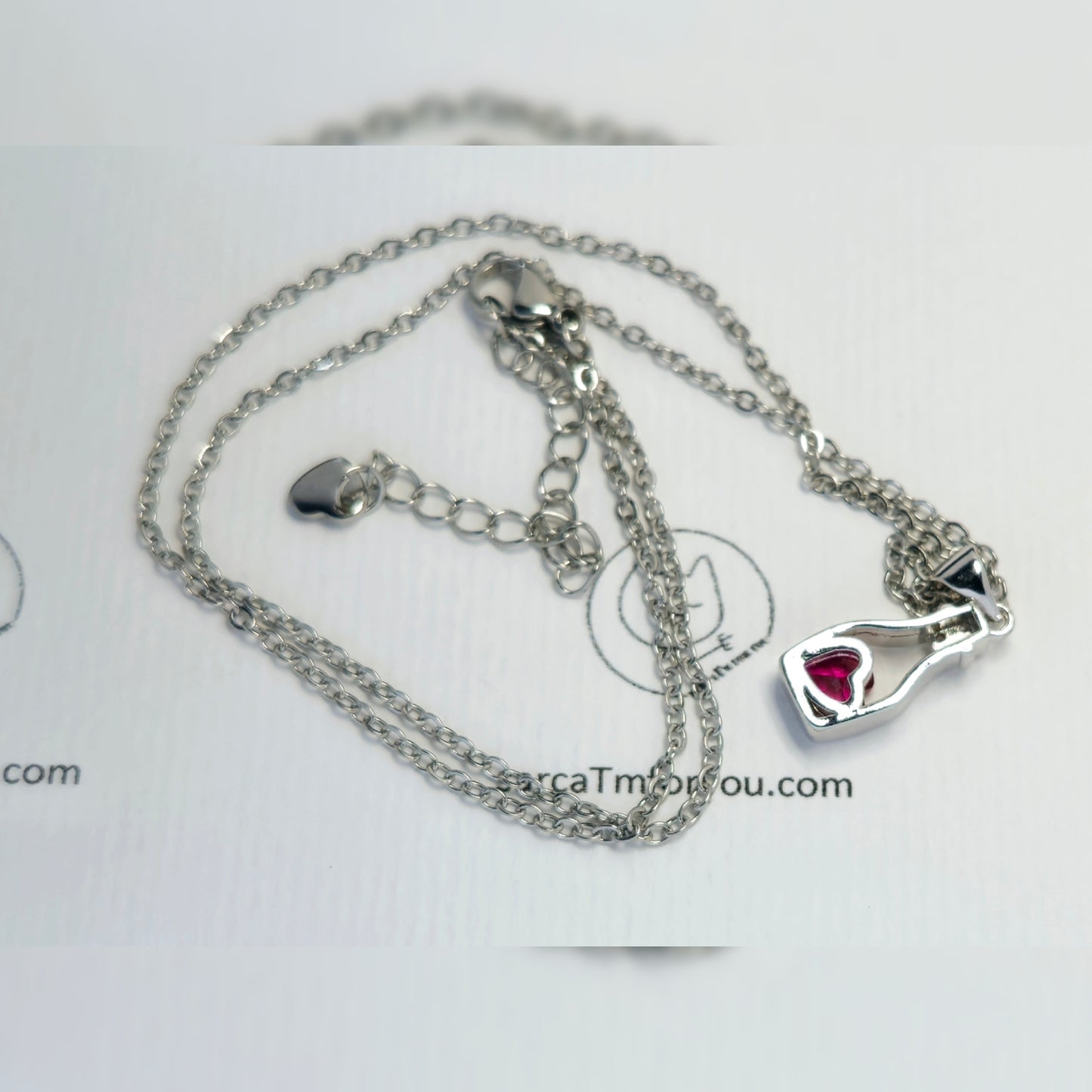Ketting met wijnfles en zirkonium hartje