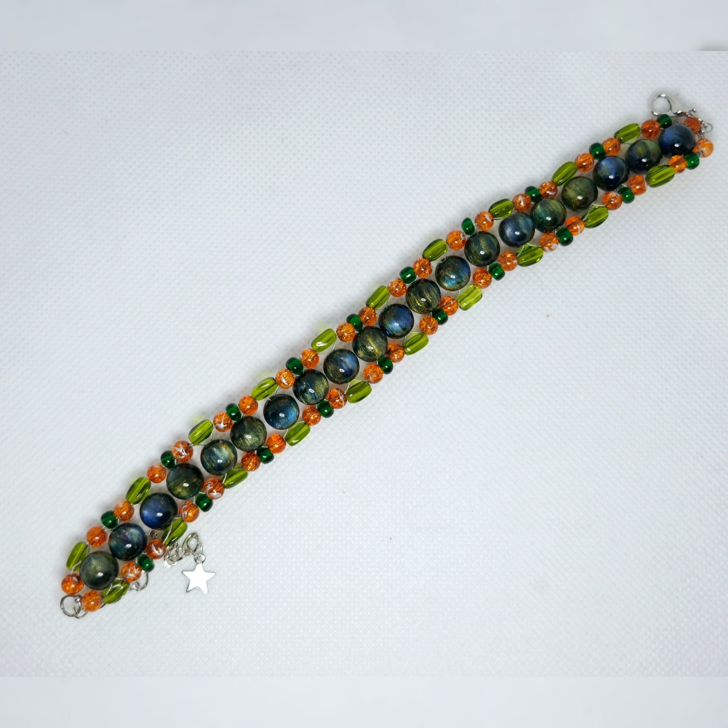 Handmade - groen/oranje vlecht