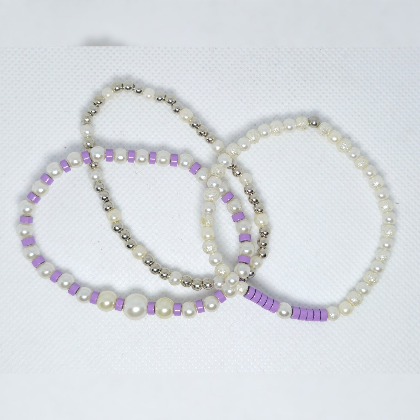 Armbandenset paars en parel