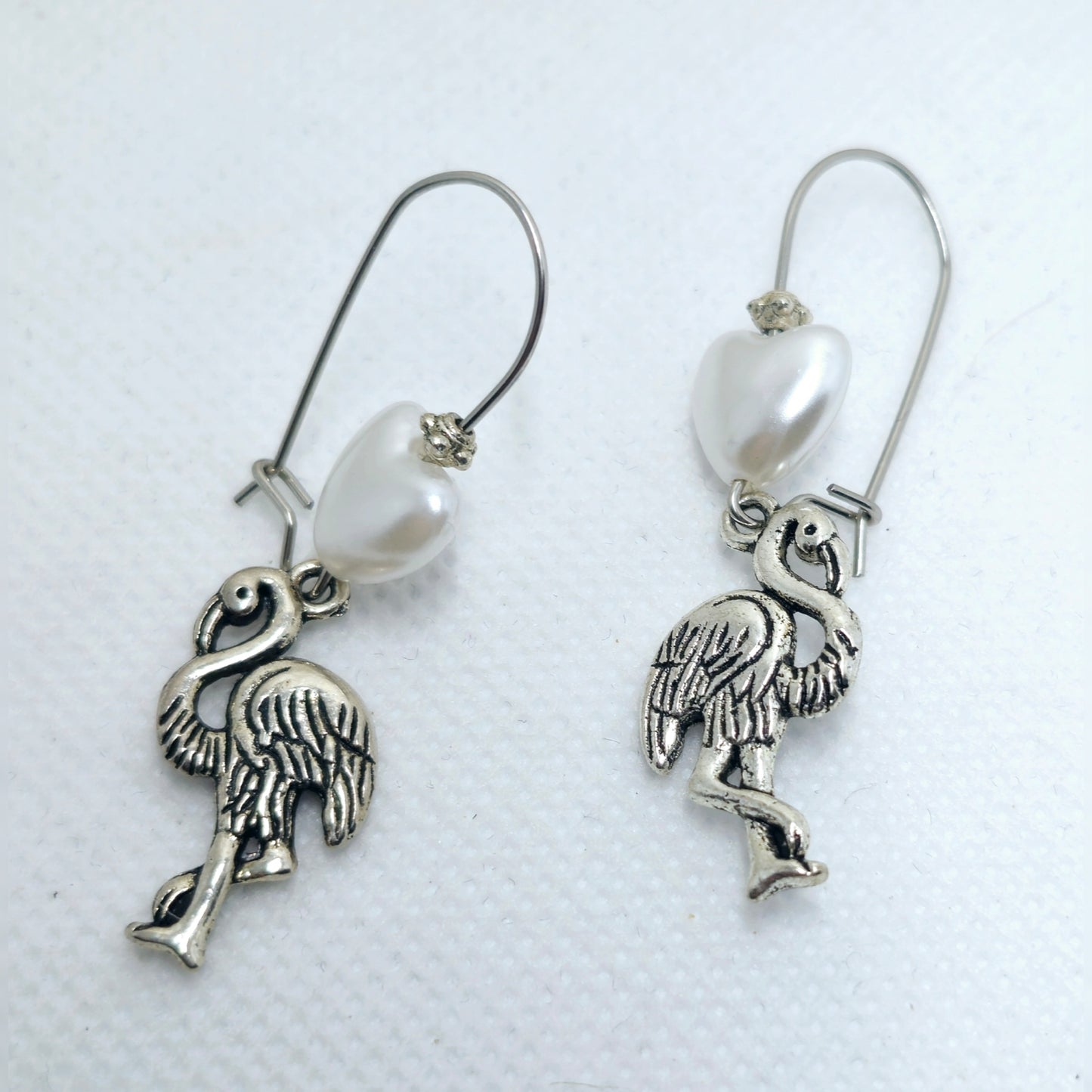 Oorbellen flamingo met parelhart
