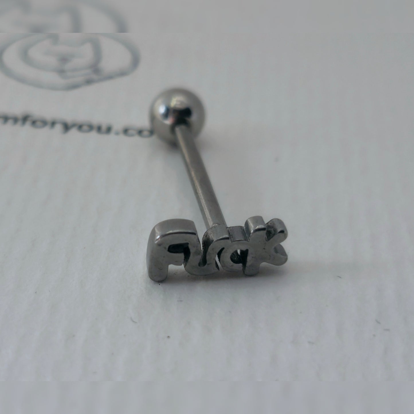 Tong piercing - F*CK