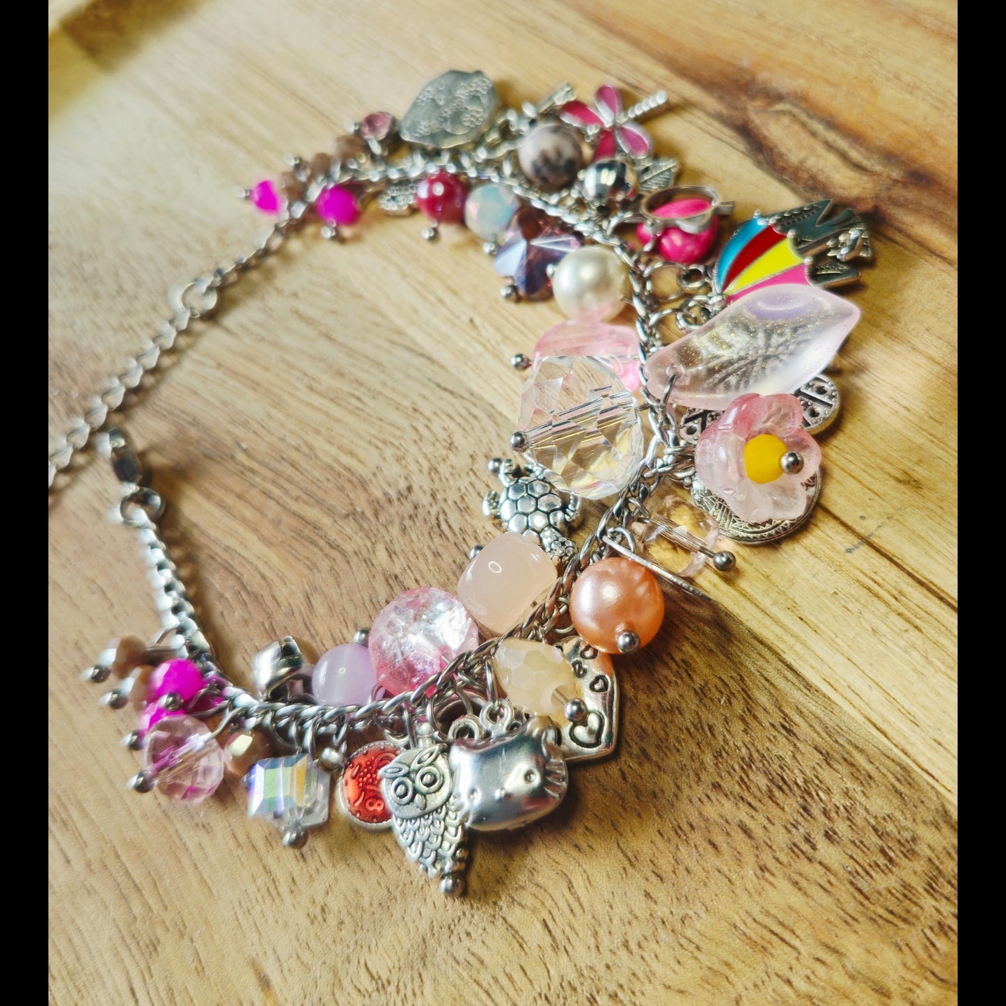 Bedelarmband roze