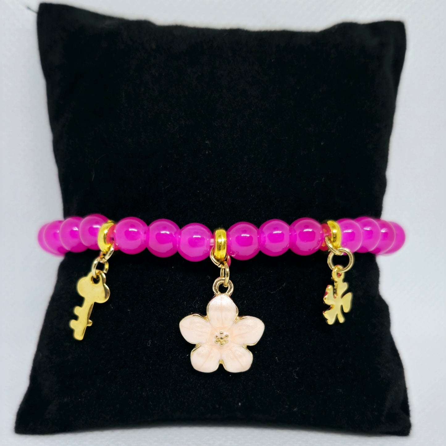 Armband roze met goudkleur