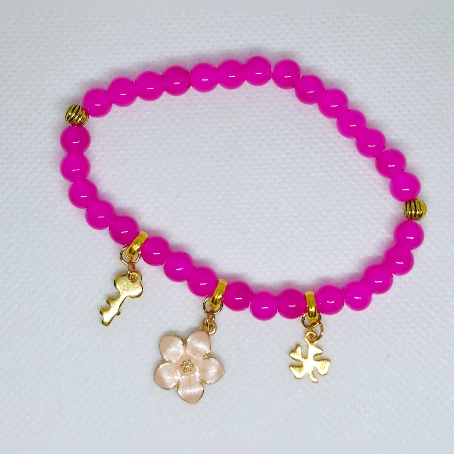 Armband roze met goudkleur