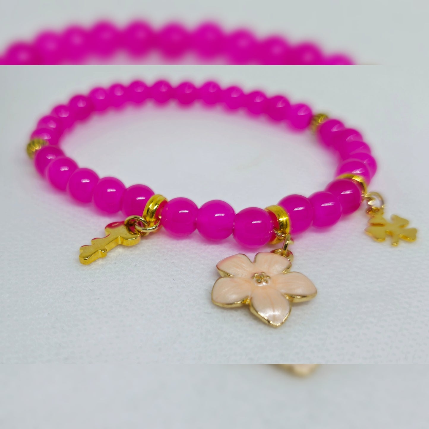 Armband roze met goudkleur