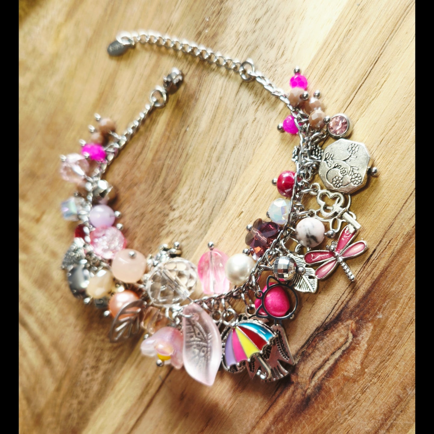 Bedelarmband roze