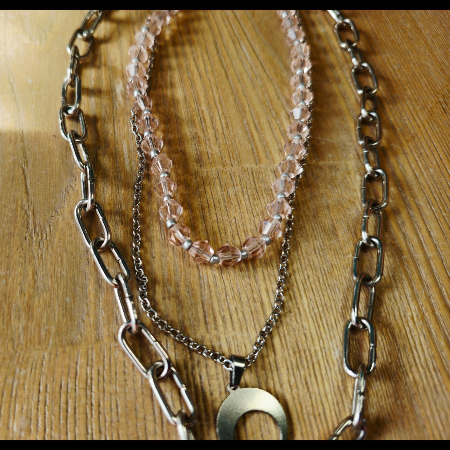 Drie-laagse ketting astronaut