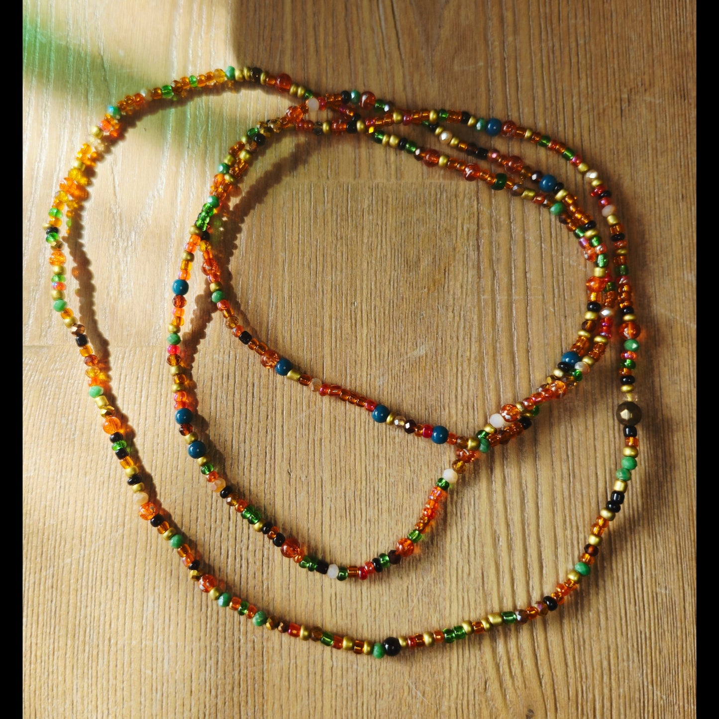 Wikkelketting of -armband