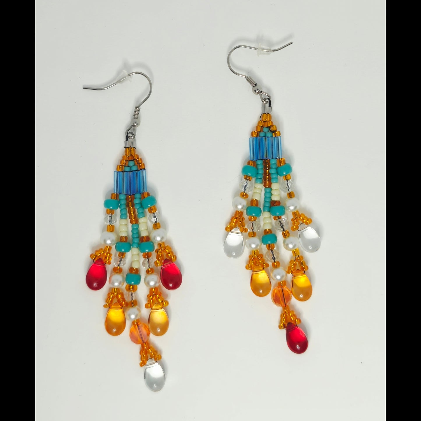Statement oorbellen oranje/turquoise