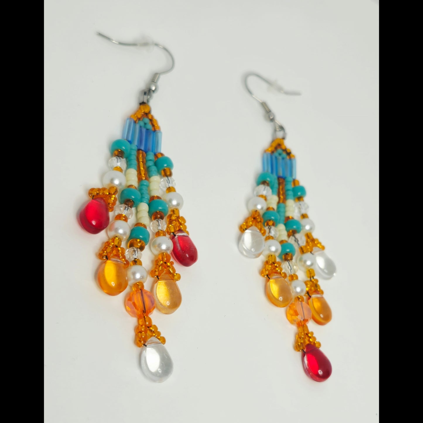 Statement oorbellen oranje/turquoise